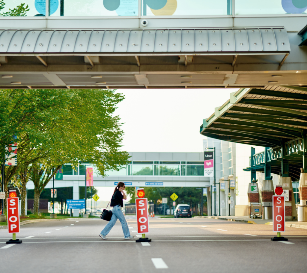 Women walking into Leahy BTV. First hour of parking free.